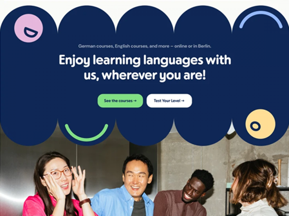 A screenshot of a website showing a photo of people smiling and a whimsical aesthetic